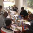 Teachers discuss ideas to use in the lessons.